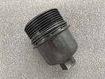 68191350AA - : 2014-20 RAM DODGE CHRYSLER JEEP 3.6 Oil Filter Housing Cap Kit OEM# 68191350AA for Chrysler: 200, 300, Pacifica, Town &amp; Country, Voyager | Dodge: Avenger, Challenger, Charger, Durango, Grand Caravan, Journey | Jeep: Cherokee, Gladiator, Grand Cherokee, Grand Cherokee L, Grand Cherokee WK, Wrangler, Wrangler JK | Ram: 1500, 1500 Classic, C/V, ProMaster 1500, ProMaster 2500, ProMaster 3500 Image