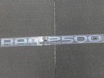 55077331AB - Exterior Ornamentation: Ram 2500 Nameplate for Mopar Image