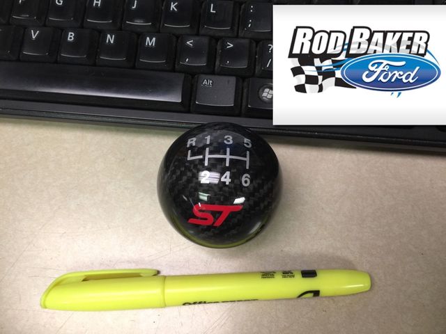 FM5Z7213C - Interior: 2013 2018 Fiesta Focus ST OEM Ford Carbon Fiber 6-speed Gear Shift Knob w/ Logo for Ford Image