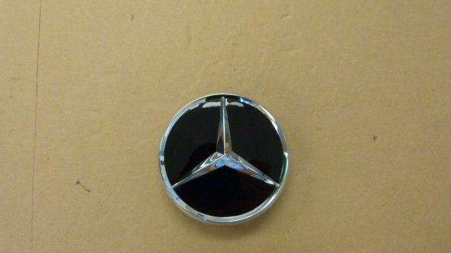 66470200 - Wheels: Hub Cap - Raised Star - Black for Mercedes-Benz Image