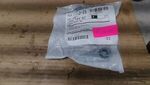 6508175AA - Front Suspension: Hex Flange Lock Nut And Retainer for Mopar Image