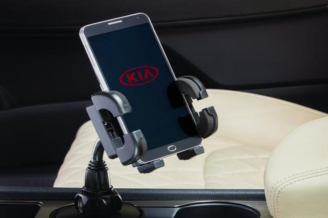 U879000000 - Audio/Video: Universal Electronics Holder for Kia: Amanti, Borrego, Cadenza, Carnival, EV6, EV9, Forte, Forte Koup, Forte5, K5, K900, Niro, Niro EV, Optima, Rio, Rio5, Rondo, Sedona, Seltos, Sorento, Soul, Soul EV, Spectra, Spectra5, Sportage, Stinger, Telluride Image