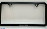 71801AB041 - Exterior: License plate frame - Slim with Logo - Black for Volkswagen: Arteon, Atlas, Beetle, CC, e-Golf, Eos, Golf, Golf Alltrack, Golf SportWagen, GTI, ID. Buzz, ID.4, Jetta, Passat, Taos, Tiguan, Tiguan Limited, Touareg Image