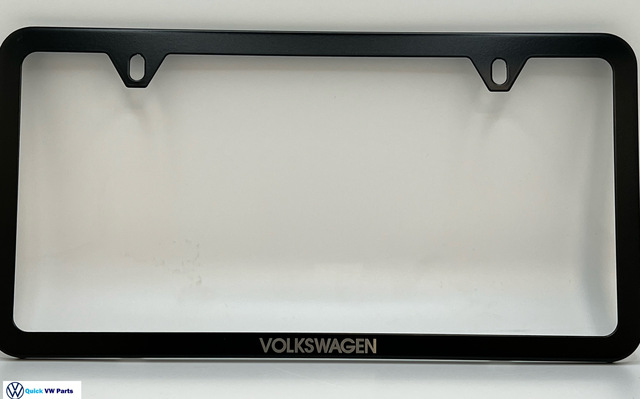 71801AB041 - Exterior: 2014-2025 Volkswagen - License Plate Frame - Slim With Logo - Black for Volkswagen: Arteon, Atlas, Beetle, CC, e-Golf, Eos, Golf, Golf Alltrack, Golf SportWagen, GTI, ID. Buzz, ID.4, Jetta, Passat, Taos, Tiguan, Tiguan Limited, Touareg Image