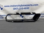 51115A09A54 - Body: Headlamp Cover for BMW Image