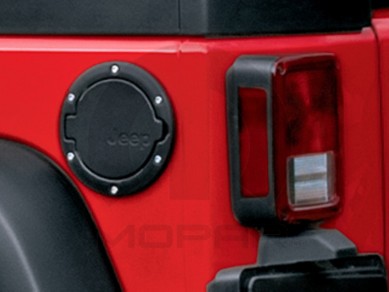 82214793 - : JEEP WRANGLER SATIN BLACK FUEL FILLER DOOR 2007-2018 for Mopar Image