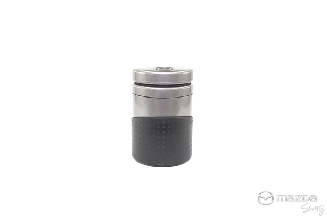 C905V0880 - Interior: Ashtray, Illuminated for Mazda: 2, 3, 5, 6, CX-3, CX-30, CX-5, CX-7, CX-9, MPV, MX-5 Miata, RX-8, Tribute Image