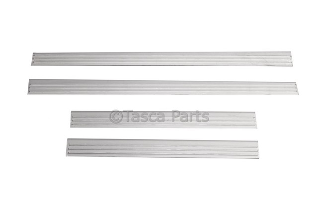 17802415 - Interior: Door Sill Plates for Cadillac: Escalade, Escalade ESV, Escalade EXT | Chevrolet: Avalanche, Silverado 1500, Silverado 1500 Classic, Silverado 1500 HD Classic, Silverado 2500 HD, Silverado 2500 HD Classic, Silverado 3500 Classic, Silverado 3500 HD, Suburban 1500, Suburban 2500 | GMC: Sierra 1500, Sierra 1500 Classic, Sierra 1500 HD, Sierra 1500 HD Classic, Sierra 2500, Sierra 2500 HD, Sierra 2500 HD Classic, Sierra 3500, Sierra 3500 Classic, Sierra 3500 HD, Yukon, Yukon XL 1500, Yukon XL 2500 Image