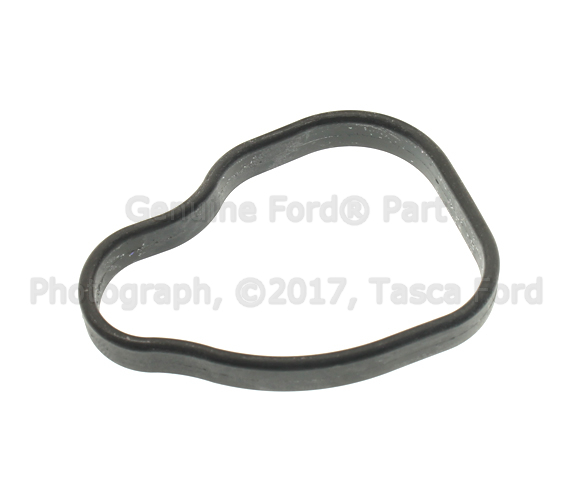 YL3Z8C387AA - Cooling System: Lower Housing Gasket for Ford: E-150, E-150 Club Wagon, E-150 Econoline, E-150 Econoline Club Wagon, E-250, E-250 Econoline, E-350 Club Wagon, E-350 Econoline Club Wagon, E-350 Super Duty, E-450 Econoline Super Duty, E-450 Super Duty, Excursion, Expedition, F-150, F-150 Heritage, F-250 Super Duty, F-350 Super Duty Image