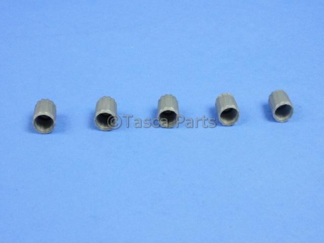 68024258AA - Wheels: Valve Stem Cap Kit for Chrysler: 200, 300, Pacifica, PT Cruiser, Sebring, Town &amp; Country | Dodge: Avenger, Caliber, Caravan, Charger, Grand Caravan, Journey, Magnum | Jeep: Commander, Compass, Grand Cherokee, Liberty, Patriot Image