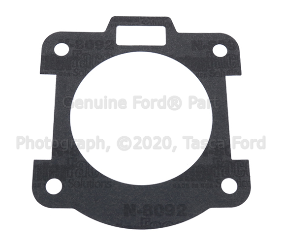 F75Z9E936AA - Air &amp; Fuel Delivery: Fuel Injection Throttle Body Mounting Gasket for Ford: E-150 Econoline, E-150 Econoline Club Wagon, E-250 Econoline, F-150, Mustang Image