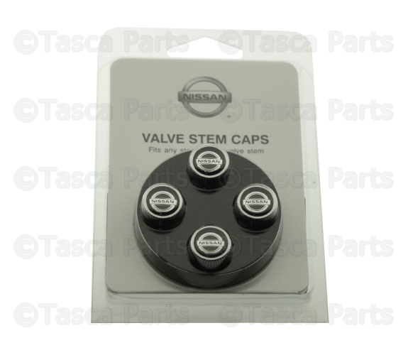 999MBSX000 - Exterior: Valve Stem Caps, Nissan Logo for Nissan: 200SX, 240SX, 300ZX, 350Z, 370Z, Altima, Armada, Axxess, Cube, Frontier, GT-R, Juke, Kicks, LEAF, Maxima, Murano, NV1500, NV200, NV2500, NV3500, NX, Pathfinder, Pickup, Pulsar NX, Quest, Rogue, Rogue Sport, Sentra, Stanza, TITAN, TITAN XD, Versa, Versa Note, Xterra Image