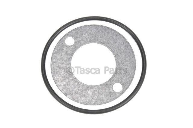 88893990 - Engine: Engine Oil Filter Adapter Gasket for Buick: Roadmaster | Cadillac: Brougham, Escalade, Fleetwood | Chevrolet: Blazer, C/K Pickup, C1500, C2500, C3500, C3500HD, Caprice, Corvette, Express 1500, Express 2500, Express 3500, G10, G20, G30, Impala, K1500 Pickup, K2500 Pickup, K3500 Pickup, K5 Blazer, P20, P30, R10, R20, R2500, R30, R3500, Suburban C10, Suburban C1500, Suburban C20, Suburban C2500, Suburban K10, Suburban K1500, Suburban K20, Suburban K2500, Suburban R10, Suburban R1500, Suburban R20, Suburban R2500, Suburban V10, Suburban V1500, Suburban V20, Suburban V2500, Tahoe, V10, V20, V30, V3500 | GMC: C1500 Pickup, C2500 Pickup, C3500 Pickup, C3500HD, G1500, G2500, G3500, Jimmy, K1500 Pickup, K2500 Pickup, K3500 Pickup, P2500, P3500, R1500 Pickup, R2500 Pickup, R3500 Pickup, Savana 1500, Savana 2500, Savana 3500, Suburban C1500, Suburban C2500, Suburban K1500, Suburban K2500, Suburban R1500, Suburban R2500, V1500, V1500 Suburban, V2500, V2500 Suburban, V3500, Yukon | Oldsmobile: Custom Cruiser Image