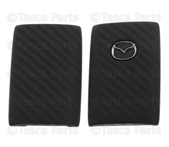 C9N1V0450 - Security: Key Fob Cover - Carbon Fiber for Mazda: 3, CX-30, CX-5, CX-50, CX-70, CX-9, CX-90, MX-30 EV Image