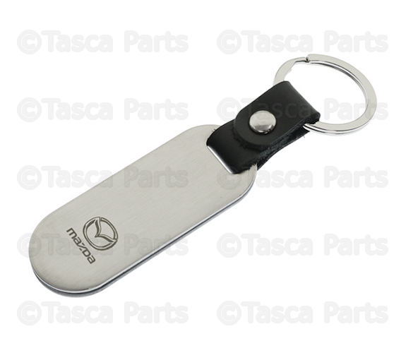C9N1V0440 - Merchandise: Key Chain, Mazda Logo, Brushed for Mazda: 2, 3, 5, 6, CX-3, CX-30, CX-5, CX-50, CX-7, CX-9, MPV, MX-5 Miata, RX-8, Tribute Image