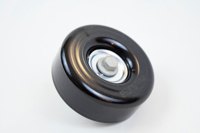 12580773 - Cooling System: Accessory Drive Belt Idler Pulley for Cadillac: Escalade | Chevrolet: Astro, Blazer, C1500, C2500, C3500, C3500HD, Express 1500, Express 2500, Express 3500, K1500 Pickup, K2500 Pickup, K3500 Pickup, P30, S10, Suburban C1500, Suburban C2500, Suburban K1500, Suburban K2500, Tahoe | GMC: C1500 Pickup, C2500 Pickup, C3500 Pickup, C3500HD, Jimmy, K1500 Pickup, K2500 Pickup, K3500 Pickup, P3500, Safari, Savana 1500, Savana 2500, Savana 3500, Sonoma, Suburban C1500, Suburban C2500, Suburban K1500, Suburban K2500, Yukon | Oldsmobile: Bravada Image