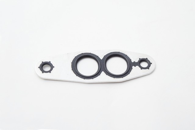 23129010 - : Part# 23129010 Engine Oil Cooler Gasket for Cadillac: Escalade, Escalade ESV | Chevrolet: Express 2500, Express 3500, Express 4500, Silverado 1500, Silverado 1500 LD, Silverado 1500 LTD, Silverado 2500 HD, Silverado 3500 HD, Suburban, Tahoe | GMC: Savana 2500, Savana 3500, Savana 4500, Sierra 1500, Sierra 1500 Limited, Sierra 2500 HD, Sierra 3500 HD, Yukon, Yukon XL Image