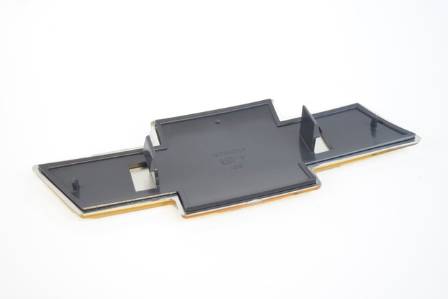 12335633 - Body: Emblem for Chevrolet: Silverado 1500, Silverado 1500 HD, Silverado 2500, Silverado 2500 HD, Silverado 3500, Suburban 1500, Suburban 2500, Tahoe Image