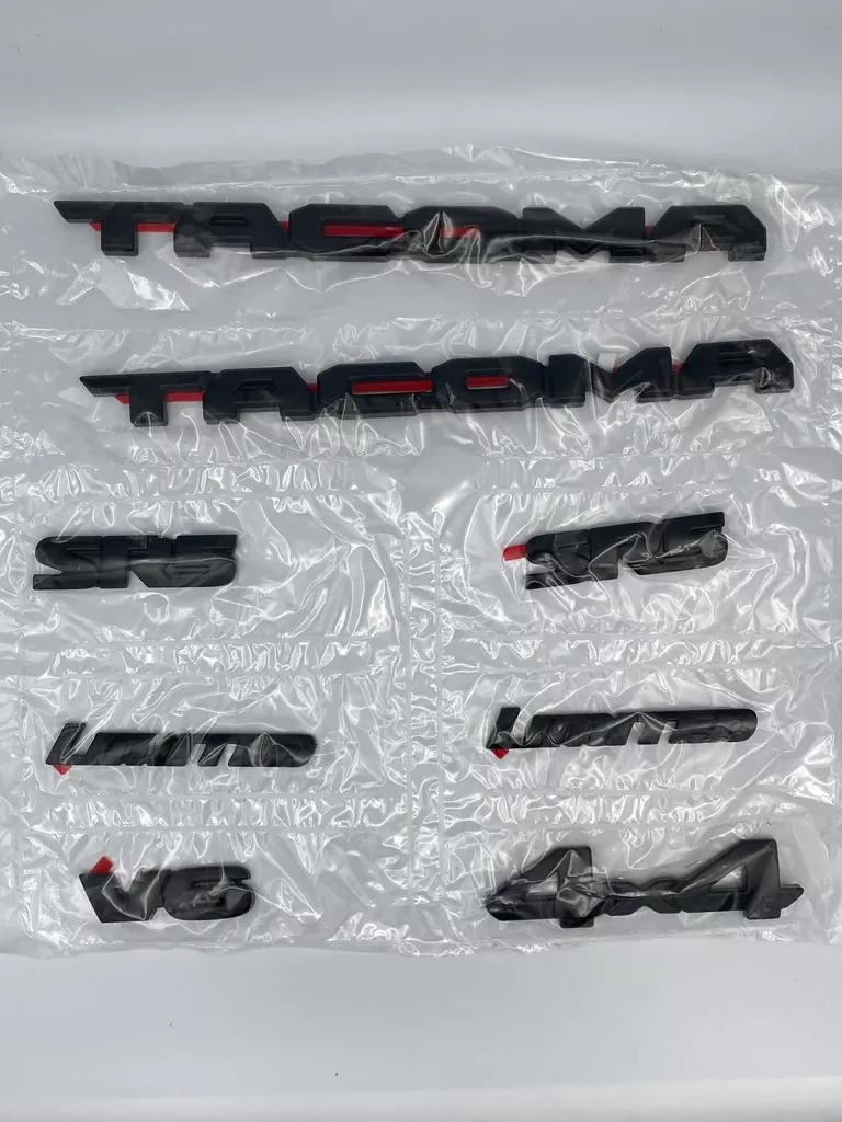 PT9483518002 - Exterior: Exterior Trim, Emblem Blackout Overlays for Toyota: Tacoma Image