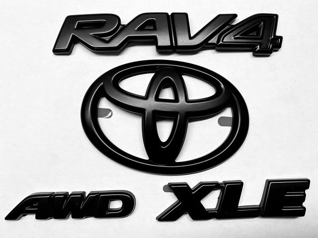 PT9484219302 - Exterior: Exterior Emblem Blackout Overlays, XLE AWD (Toyota Rav4) Genuine Toyota Accessory - New - for Toyota: RAV4 Image