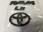 PT9484219402 - : Exterior Emblem Blackout Overlay, LE Model (Toyota Rav4) Genuine Toyota Accessories - New - for Toyota: RAV4, RAV4 Prime Image