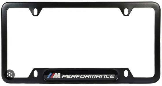 82125A1C494 - Exterior: License Plate Frame, Powered By M for BMW: 228i, 230i, 320i, 328d, 328i, 330e, 330i, 330i GT xDrive, 335i, 340i, 340i GT xDrive, 428i, 430i, 430i Gran Coupe, 435i, 440i, 528i, 530i, 535d, 535i, 540i, 550i, 640i, 640i Gran Coupe, 640i xDrive Gran Turismo, 650i, 650i Gran Coupe, 740i, 740Li, 750i, 750Li, 760Li, 840i, 840i Gran Coupe, Alpina B6 xDrive Gran Coupe, Alpina B7, M2, M235i, M240i, M3, M340i, M4, M440i Gran Coupe, M5, M550i xDrive, M6, M6 Gran Coupe, M760i xDrive, M8, X1, X2, X3, X4, X5, X6, X7, Z4 Image