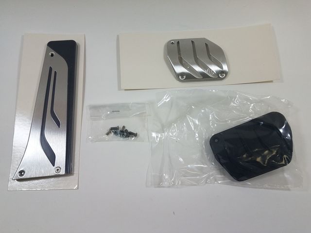 35002232278 - Interior: M Performance Pedal Cover Stainless Steel for BMW: 228i, 228i xDrive, 230i, 230i xDrive, 320i, 320i xDrive, 328d, 328d xDrive, 328i, 328i xDrive, 330e, 330i, 330i GT xDrive, 330i xDrive, 335i, 335i xDrive, 340i, 340i GT xDrive, 340i xDrive, 428i, 428i xDrive, 430i, 430i xDrive, 435i, 435i xDrive, 440i, 440i xDrive, 528i, 528i xDrive, 530i, 530i xDrive, 535d, 535d xDrive, 535i, 535i xDrive, 540d xDrive, 540i, 540i xDrive, 550i, 550i xDrive, 640i, 640i Gran Coupe, 640i xDrive, 640i xDrive Gran Coupe, 640i xDrive Gran Turismo, 650i, 650i Gran Coupe, 650i xDrive, 650i xDrive Gran Coupe, 740e xDrive, 740i, 740i xDrive, 740Li, 740Li xDrive, 750i, 750i xDrive, 750Li, 750Li xDrive, 760Li, Alpina B6 xDrive Gran Coupe, Alpina B7, M2, M235i, M235i xDrive, M240i, M240i xDrive, M3, M340i, M4, M5, M550i xDrive, M6, M760i xDrive, X1, X3, X4, X5, X6, X7 Image