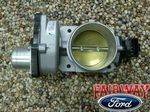 9W7Z9E926A - Fuel System: Throttle Body for Ford: Crown Victoria, E-150, E-150 Club Wagon, E-250, E-350 Super Duty, E-450 Super Duty, Explorer, Explorer Sport Trac, F-150, F-150 Heritage, Mustang | Lincoln: LS, Town Car, Zephyr | Mercury: Grand Marquis, Mountaineer Image