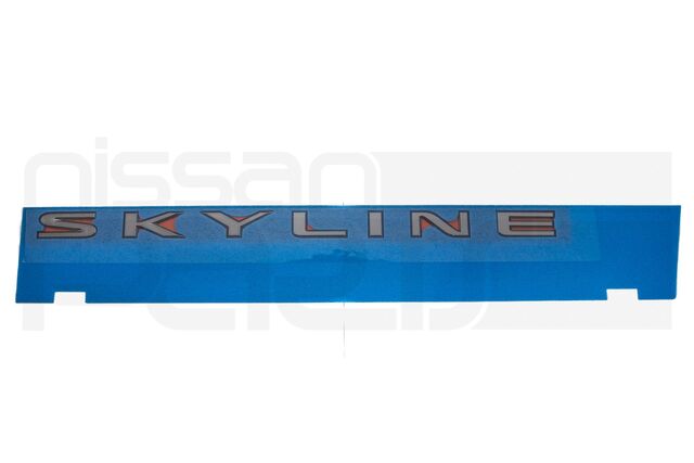 84895AA000 - : "SKYLINE" TRUNK NAMEPLATE (4-DOOR) (R34 SKYLINE) for Nissan: GT-R Image