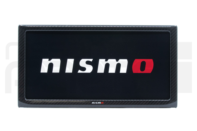 96210RN010 - : NISMO CARBON FIBER NUMBER PLATE FRAME for Nissan: 200SX, 240SX, 280ZX, 300ZX, 310, 350Z, 720, Altima, Armada, Axxess, Cube, Frontier, GT-R, Juke, Kicks, Maxima, Murano, NV1500, NV200, NV2500, NV3500, Pathfinder, Pathfinder Armada, Pulsar NX, Quest, Rogue, Rogue Select, Sentra, Stanza, TITAN, TITAN XD, Van, Versa, Versa Note, Xterra Image