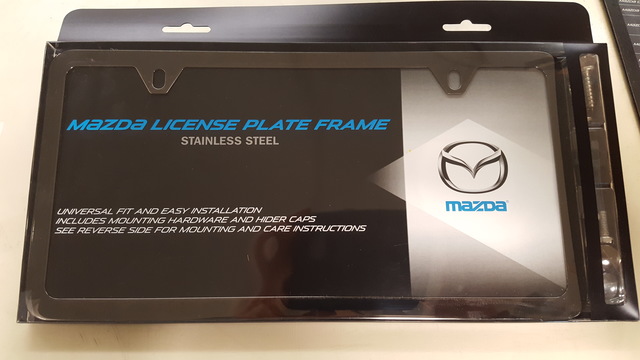 83Z37 - Exterior: License Plate Frame No Logo, Slimline for Mazda: 2, 3, 5, 6, CX-3, CX-5, CX-7, CX-9, MPV, MX-5 Miata, RX-8, Tribute Image