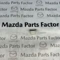EG2151146 - : 2007-2024 Mazda - Backup Lamp Assembly Fastener for Mazda: 2, 3, 6, CX-3, CX-30, CX-5, CX-50, CX-7, CX-70, CX-9, CX-90, MX-30 EV Image