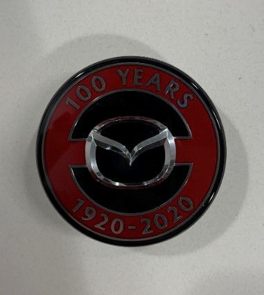 DJ15-37-190 - 100th anniversary center cap | Mazda Parts Factor
