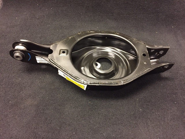 551B0-6JU1A - Link Complete-Rear Suspension Lower, Rear