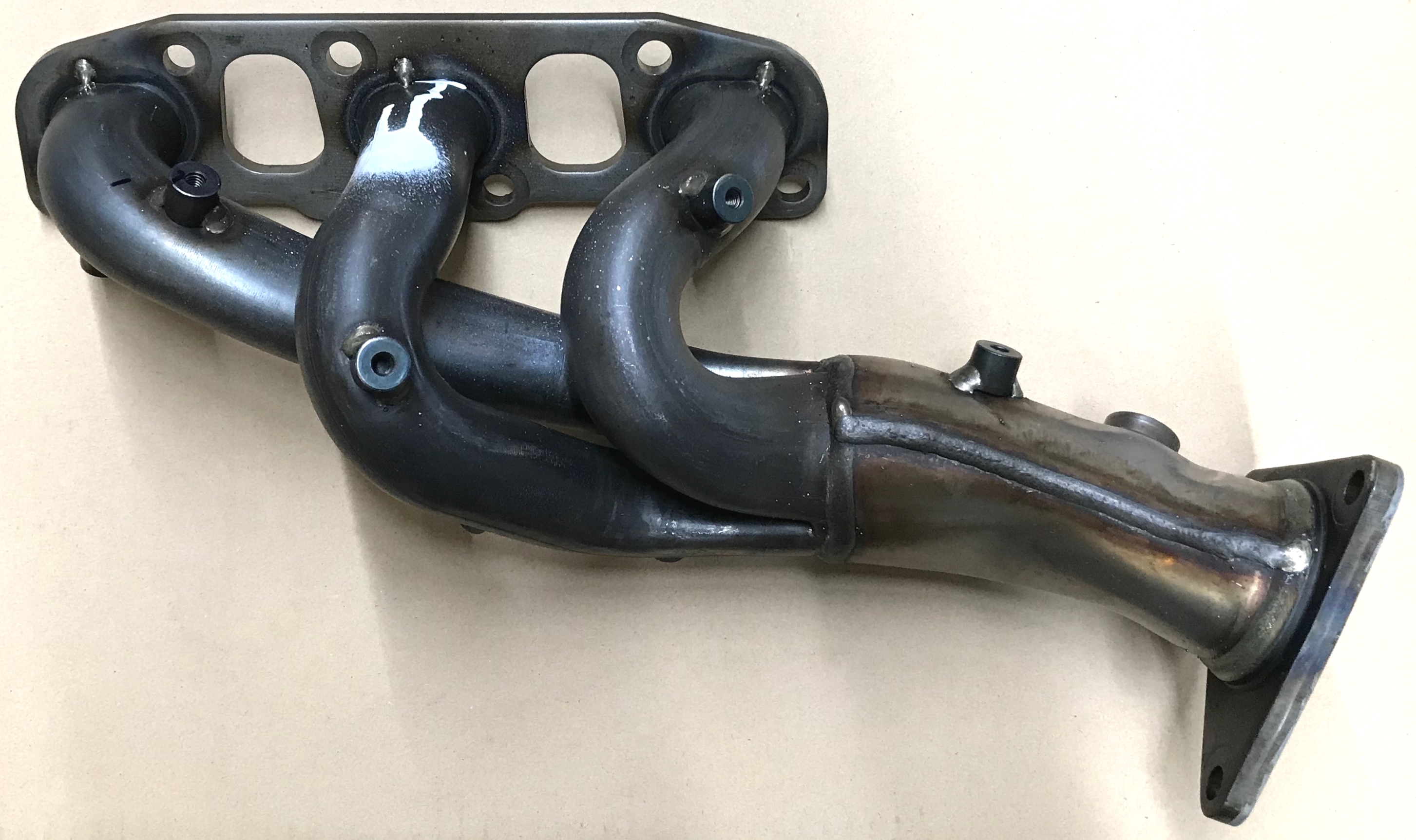 140D2EY02B - : Exhaust Manifold for INFINITI: EX37, FX37, G37, M35h, M37, Q60, QX50, QX70 Image