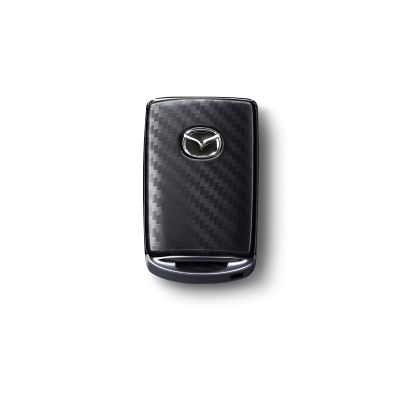 C9N1V0450 - Security: Key Fob Cover - Carbon Fiber for Mazda: 3, CX-30, CX-5, CX-50, CX-70, CX-9, CX-90, MX-30 EV Image