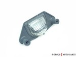 16519986 - Electrical: License Lamp for Buick: Skyhawk | Chevrolet: Beretta, Corvette, Impala, Lumina, Monte Carlo, S10, SSR | GMC: S15, Sonoma, Syclone | Oldsmobile: Cutlass Ciera | Pontiac: Aztek, Firebird, Grand Prix, J2000 Sunbird, LeMans, Sunbird Image