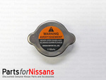 21430D999A - Cooling System: Cap for Nissan: 350Z, Armada, Murano, NV1500, NV2500, NV3500, Pathfinder, TITAN, TITAN XD Image