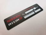 KWA5A60K00 - : JDM NISMO CARBON OIL CHANGE PLATE for Nissan Image