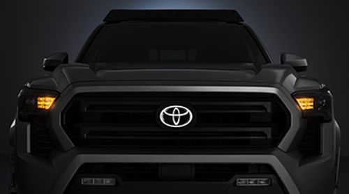 PT41335250 - Exterior: Illuminated Chrome Sombrero Front Emblem for Toyota Image