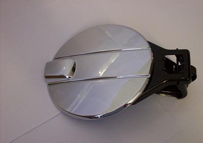 19212251 - Exterior: Fuel Door - Chrome for Chevrolet: Silverado 1500, Silverado 1500 Classic, Silverado 1500 HD Classic, Silverado 2500 HD, Silverado 2500 HD Classic, Silverado 3500 Classic, Silverado 3500 HD | GMC: Sierra 1500, Sierra 1500 Classic, Sierra 1500 HD, Sierra 1500 HD Classic, Sierra 2500, Sierra 2500 HD, Sierra 2500 HD Classic, Sierra 3500, Sierra 3500 Classic, Sierra 3500 HD Image