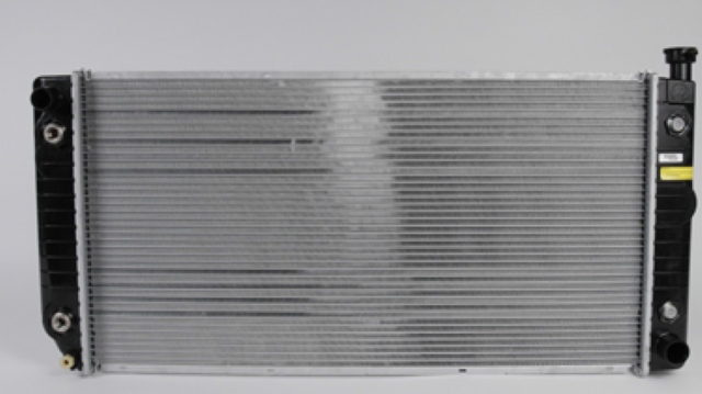 52481442 - Cooling System: Radiator for Cadillac: Escalade | Chevrolet: C1500, C2500, C3500, C3500HD, K1500 Pickup, K2500 Pickup, K3500 Pickup, Suburban C1500, Suburban C2500, Suburban K1500, Suburban K2500, Tahoe | GMC: C1500 Pickup, C2500 Pickup, C3500 Pickup, C3500HD, K1500 Pickup, K2500 Pickup, K3500 Pickup, Suburban C1500, Suburban C2500, Suburban K1500, Suburban K2500, Yukon Image