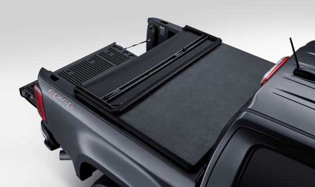 19367127 - Exterior: Soft Tri-Fold Tonneau Cover with GMC Logo for Chevrolet: Silverado 1500 LD, Silverado 2500 HD, Silverado 3500 HD | GMC: Sierra 1500, Sierra 1500 Limited, Sierra 2500 HD, Sierra 3500 HD Image