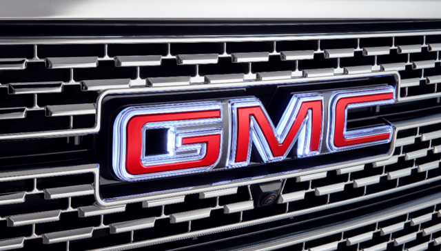 85018655 - Exterior: (Replaces 84222842) Exterior Emblem, Illuminated Gmc, Red for GMC: Sierra 1500, Sierra 2500 HD, Sierra 3500 HD Image