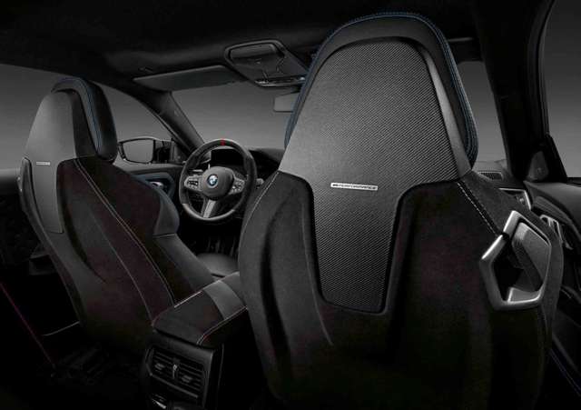52105A40301 - : BMW OEM M PERFORMANCE REAR SEAT PANEL COVER IN MATTE CARBON FIBER &amp; ALCANTARA for BMW: M2, M4, M8 Image