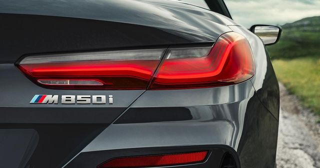 51148079112 - : BMW OEM CERIUM GREY TRUNK BADGE for BMW: M850i xDrive, M850i xDrive Gran Coupe Image