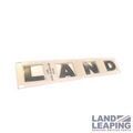 LR002213 - : Nameplate - "LAND" portion for Land Rover: LR2 Image