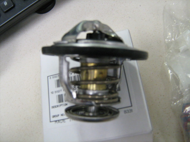 97241129 - Cooling System: Thermostat for Chevrolet: Express 2500, Express 3500, Express 4500, Silverado 2500 HD, Silverado 2500 HD Classic, Silverado 3500, Silverado 3500 Classic, Silverado 3500 HD | GMC: Savana 2500, Savana 3500, Savana 4500, Sierra 2500 HD, Sierra 2500 HD Classic, Sierra 3500, Sierra 3500 Classic, Sierra 3500 HD Image