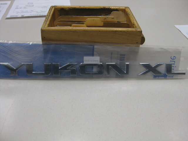 15825689 - Body: Nameplate for GMC: Yukon XL, Yukon XL 1500, Yukon XL 2500 Image