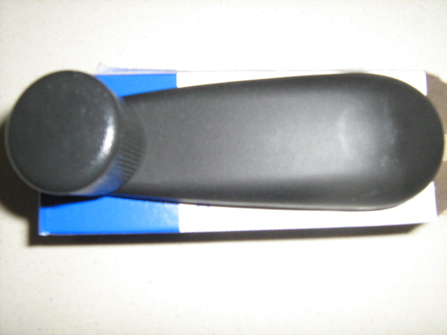 20980650 - Body: Window Handle for Cadillac: Escalade, Escalade ESV | Chevrolet: Silverado 1500, Silverado 1500 Classic, Silverado 1500 HD, Silverado 1500 HD Classic, Silverado 1500 LTD, Silverado 2500, Silverado 2500 HD, Silverado 2500 HD Classic, Silverado 3500, Silverado 3500 Classic, Silverado 3500 HD, Suburban 1500, Suburban 2500, Tahoe | GMC: Sierra 1500, Sierra 1500 Classic, Sierra 1500 HD, Sierra 1500 HD Classic, Sierra 1500 Limited, Sierra 2500, Sierra 2500 HD, Sierra 2500 HD Classic, Sierra 3500, Sierra 3500 Classic, Sierra 3500 HD, Yukon, Yukon XL 1500, Yukon XL 2500 Image